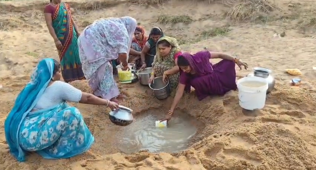 Women Forced to Drink Water from Pits
