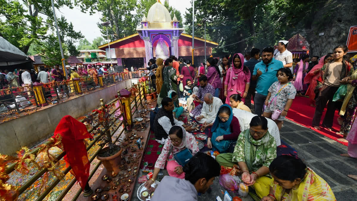 Devotees throng to offer prayers at Mata Kheer Bhawani Temple.