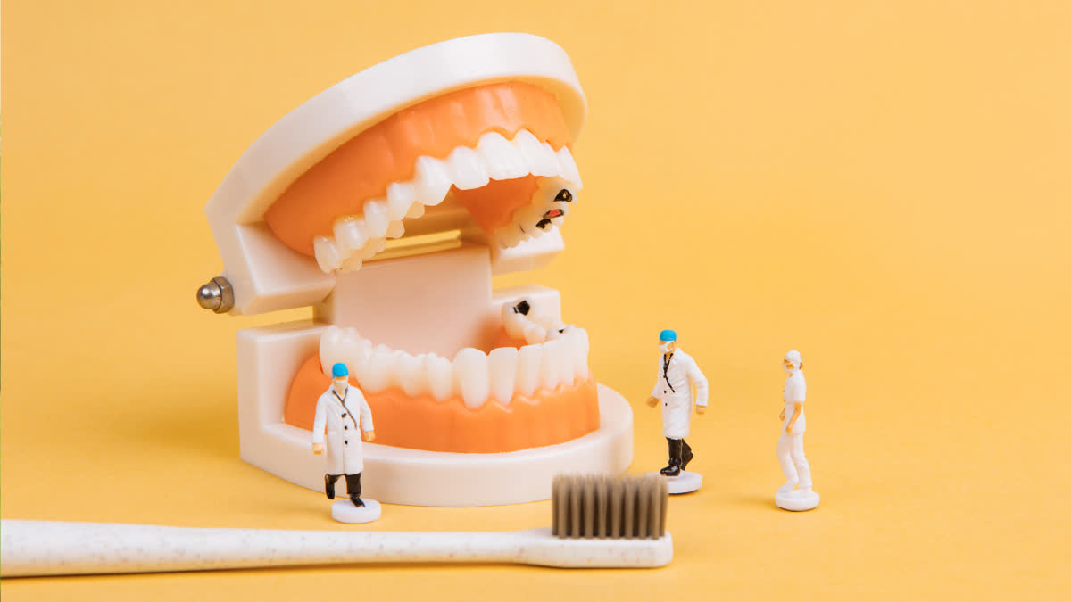How does an impacted wisdom tooth increase the risk of oral cancer?