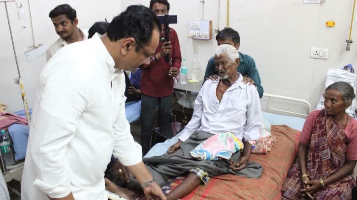 Jitu Vaghani meets the victims of hooch tragedy at ST Hospital on Saturday.
