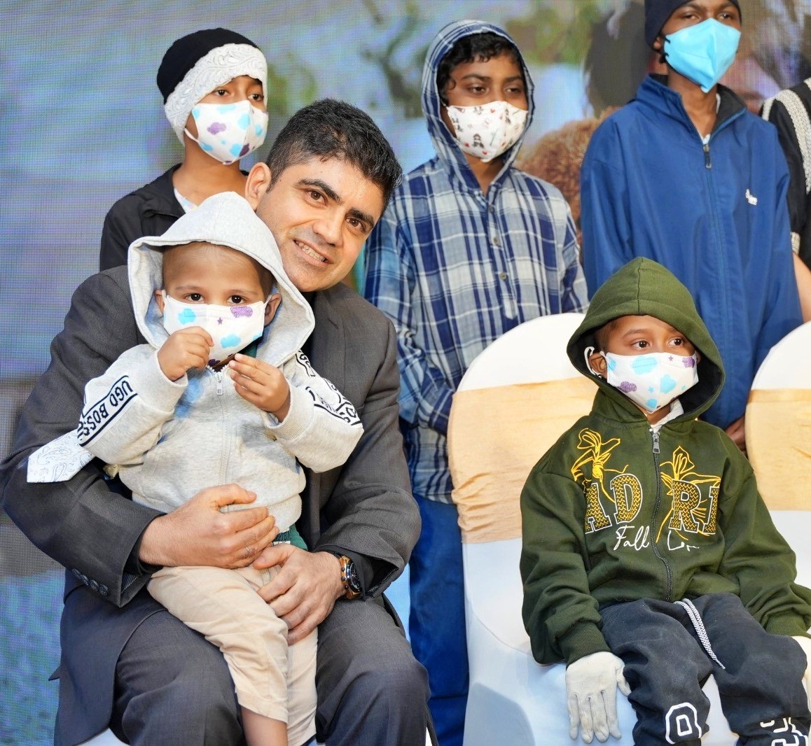 Dr. Sunil Bhat with his marrow transplant patient