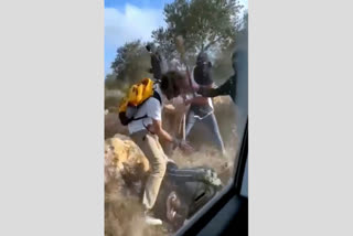 Israeli Settlers Beat Palestinian Farmers On Video As Attacks Mount During West Bank Olive Harvest