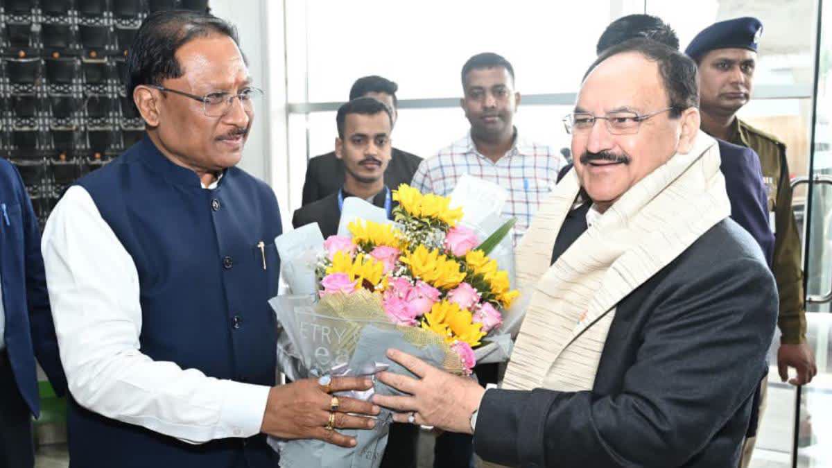 Chhattisgarh CM Vishnu Deo Sai greets JP Nadda at the Raipur Airport on Monday.