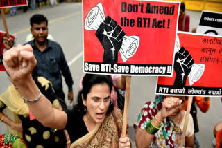 Activists shout slogans during a protest against the amendments to the Right to Information (RTI) Act in the Lok Sabha of the Indian parliament, in New Delhi on July 25, 2019.