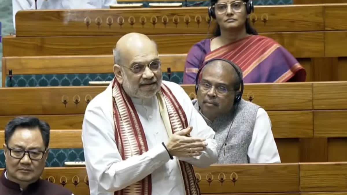 Union Home Minister Amit Shah speaks in the Lok Sabha on Monday.