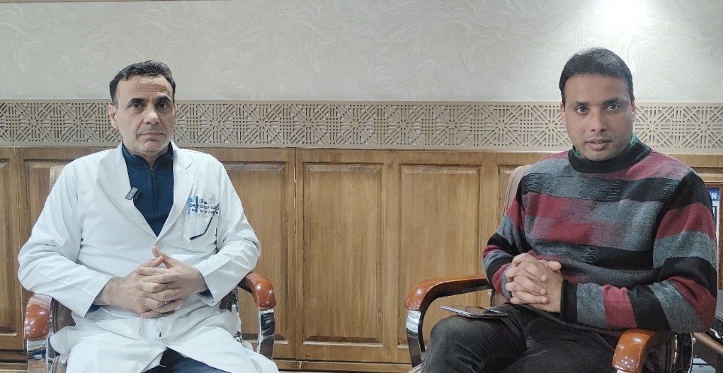 Endocrinologist Dr Muhammad Ashraf Ganai(L) in conversation with ETV Bharat correspondent Parvez ud Din