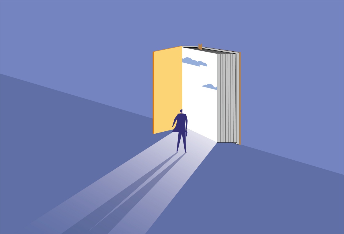 Person standing in a book doorway