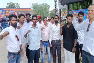 PROTEST AGAINST DULIAJAN PETROL PUMP CASE