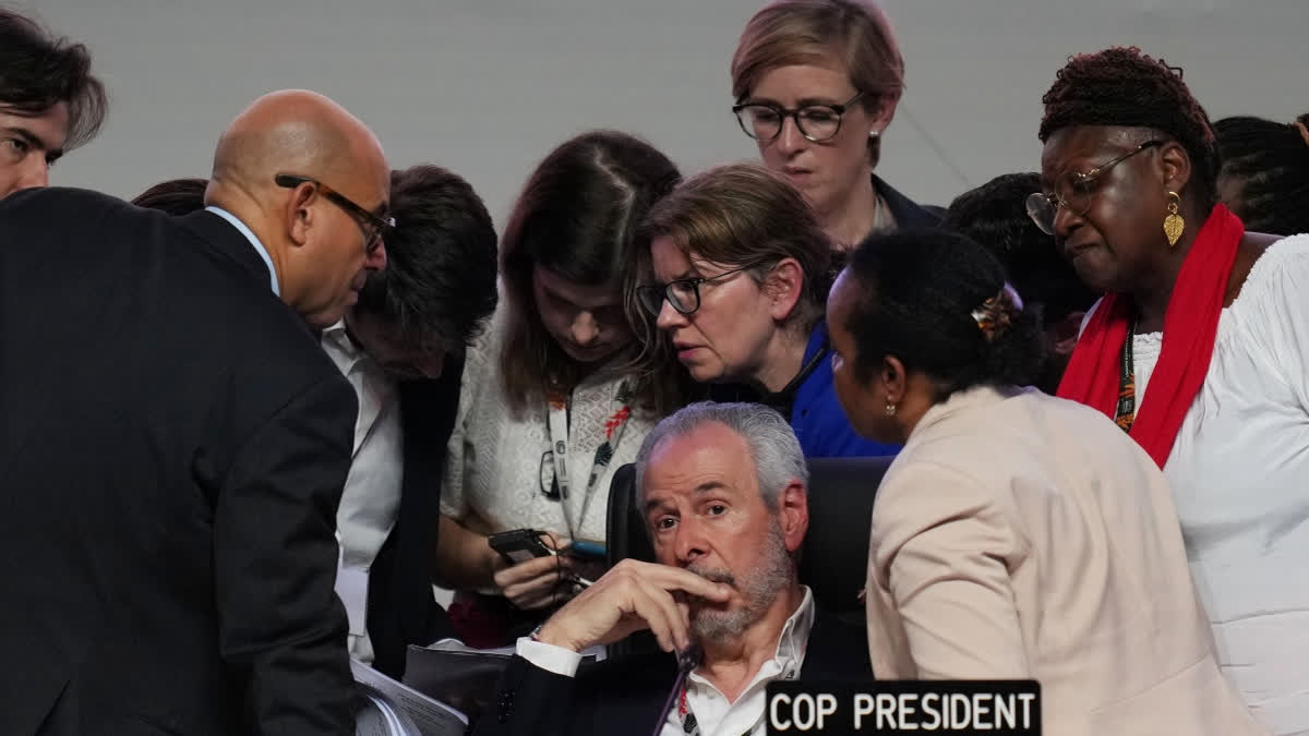 UN Climate Deal Increases Money To Countries Hit By Climate Change, But No Explicit Fossil Fuel Plan AndrĂ© CorrĂȘa do Lago, COP30 president, sits as Simon Stiell, United Nations climate chief, left, speaks with other U.N. officials during a plenary session at the COP30 U.N. Climate Summit, Saturday, Nov. 22, 2025, in Belem, Brazil.