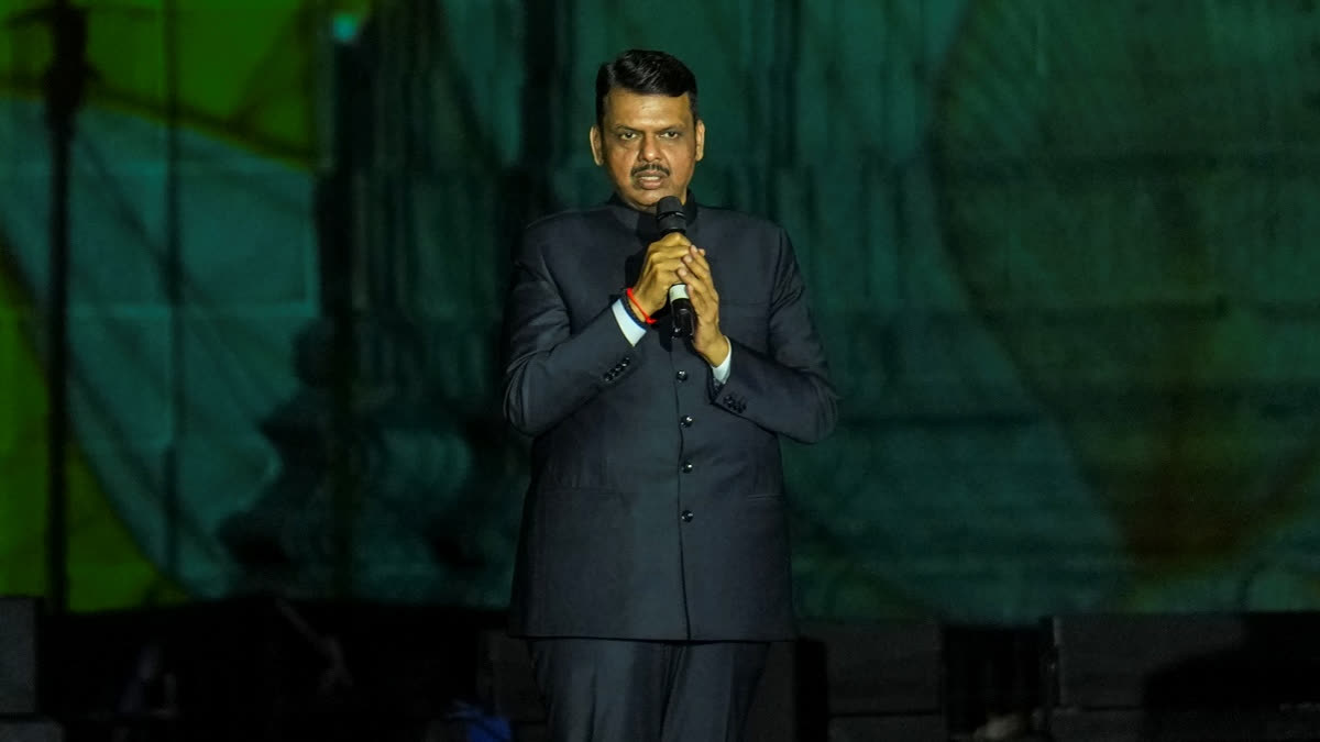 Maharashtra Chief Minister Devendra Fadnavis addresses the gathering during the Walk of Honour at the Global Peace Honours 2025, organised by Divyaj Foundation at the Gateway of India, in Mumbai, Saturday, Nov. 22, 2025.