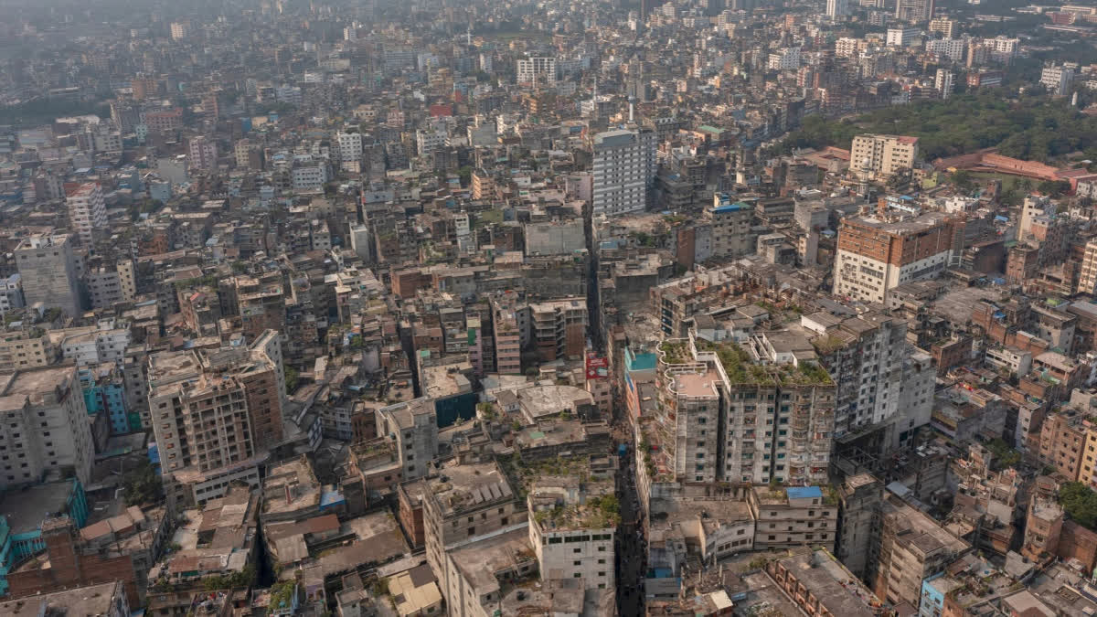 A general aerial view of an old city where roofs and walls collapsed after an earthquake in Dhaka, Bangladesh, Friday, Nov. 21, 2025.