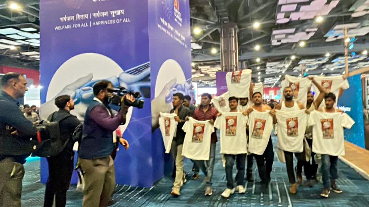 AI Summit Shirtless Protest