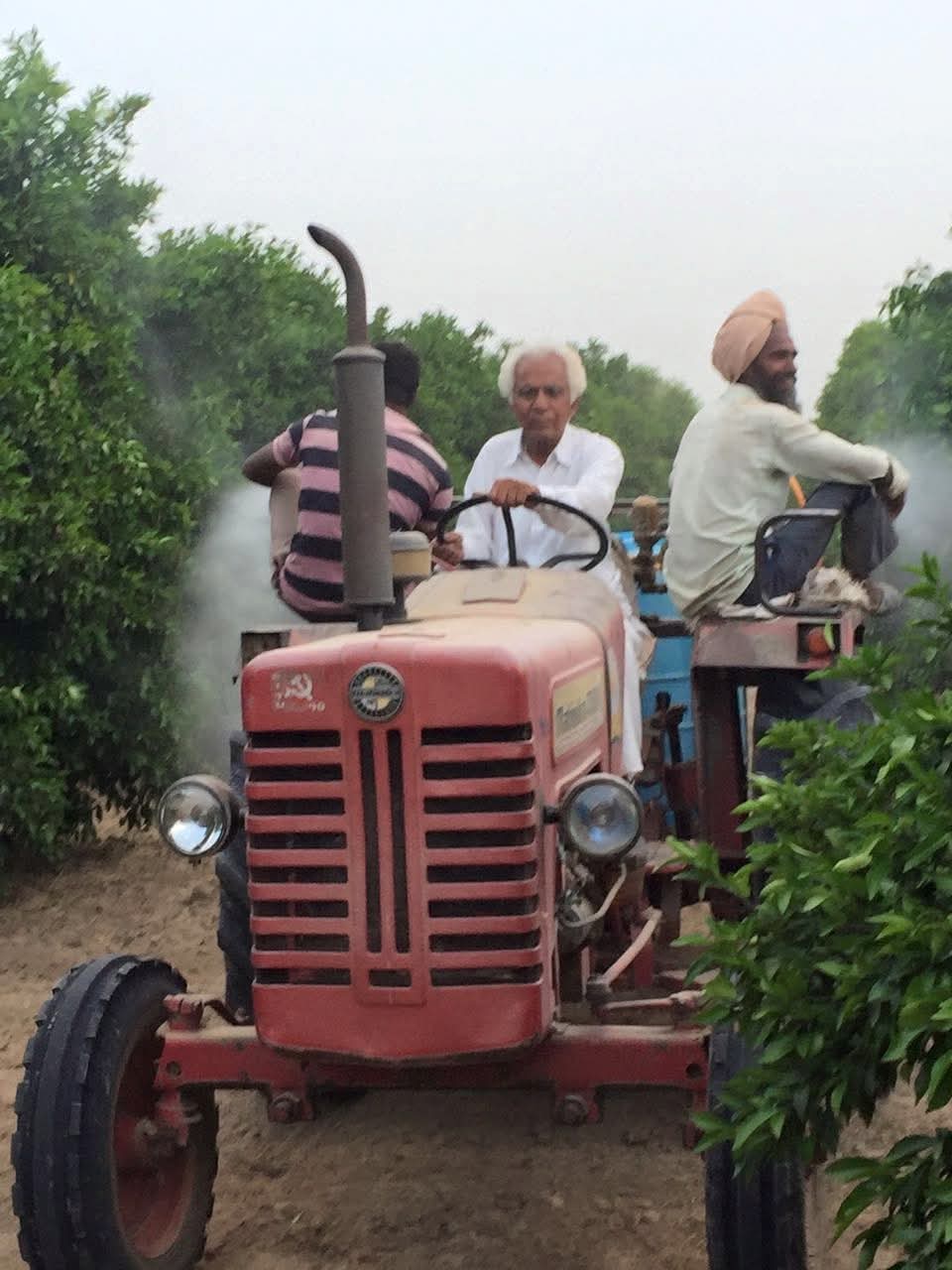 Hetram Beniwal driving a tractor