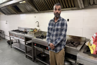 Rayees Ahmad Dar in his kitchen in Srinagar