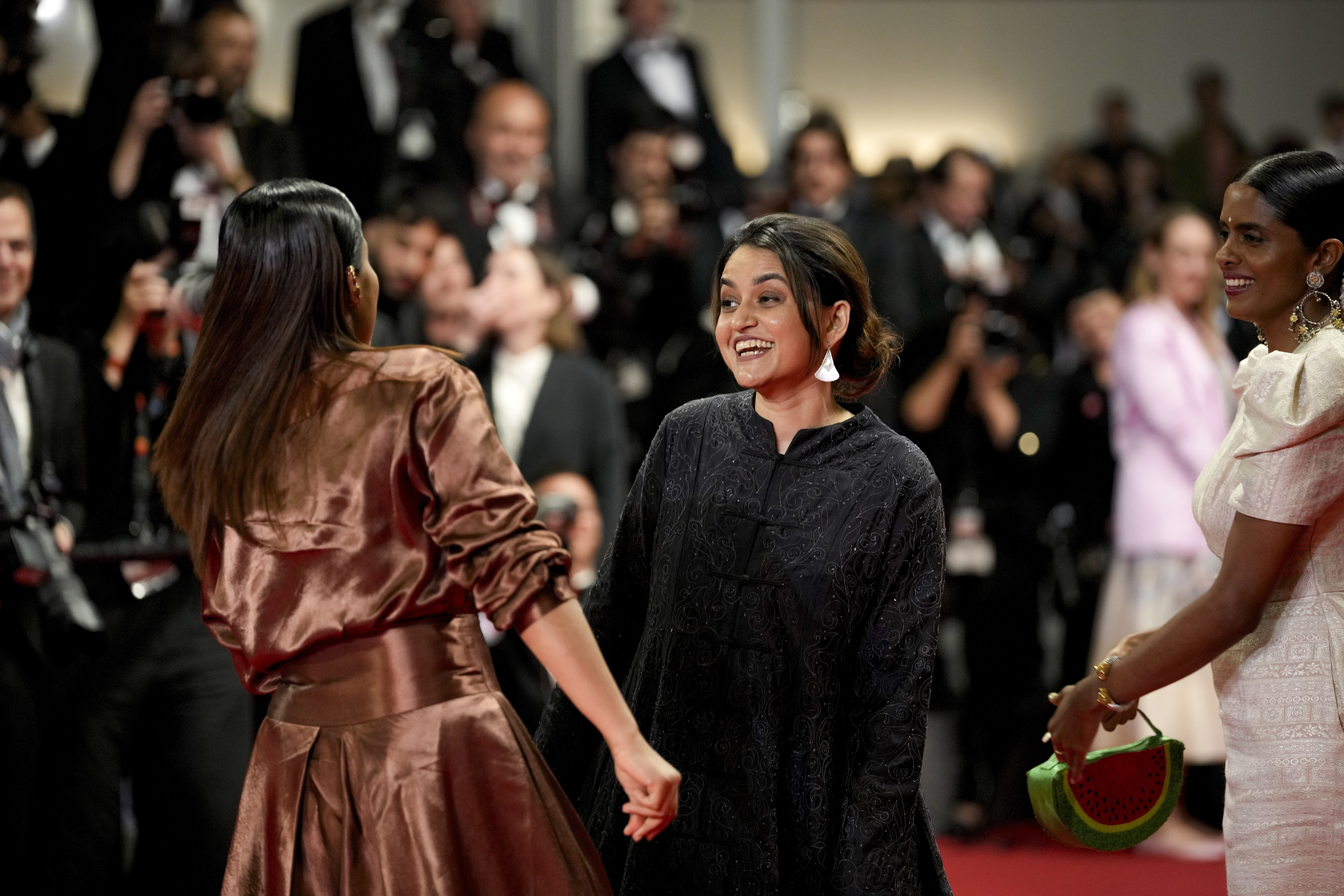 Payal Kapadia's All We Imagine As Light receives 8-minute standing ovation at the Cannes Film Festival 2024. Following the screening, Kapadia's film headlined by Kani Kusruti and Divya Prabha is garnering positive reviews. As the anticipation mounts for who will bag the prestigious Palm d'Or this year, India has hopes pinned on Payal to bring home the long-awaited glory.