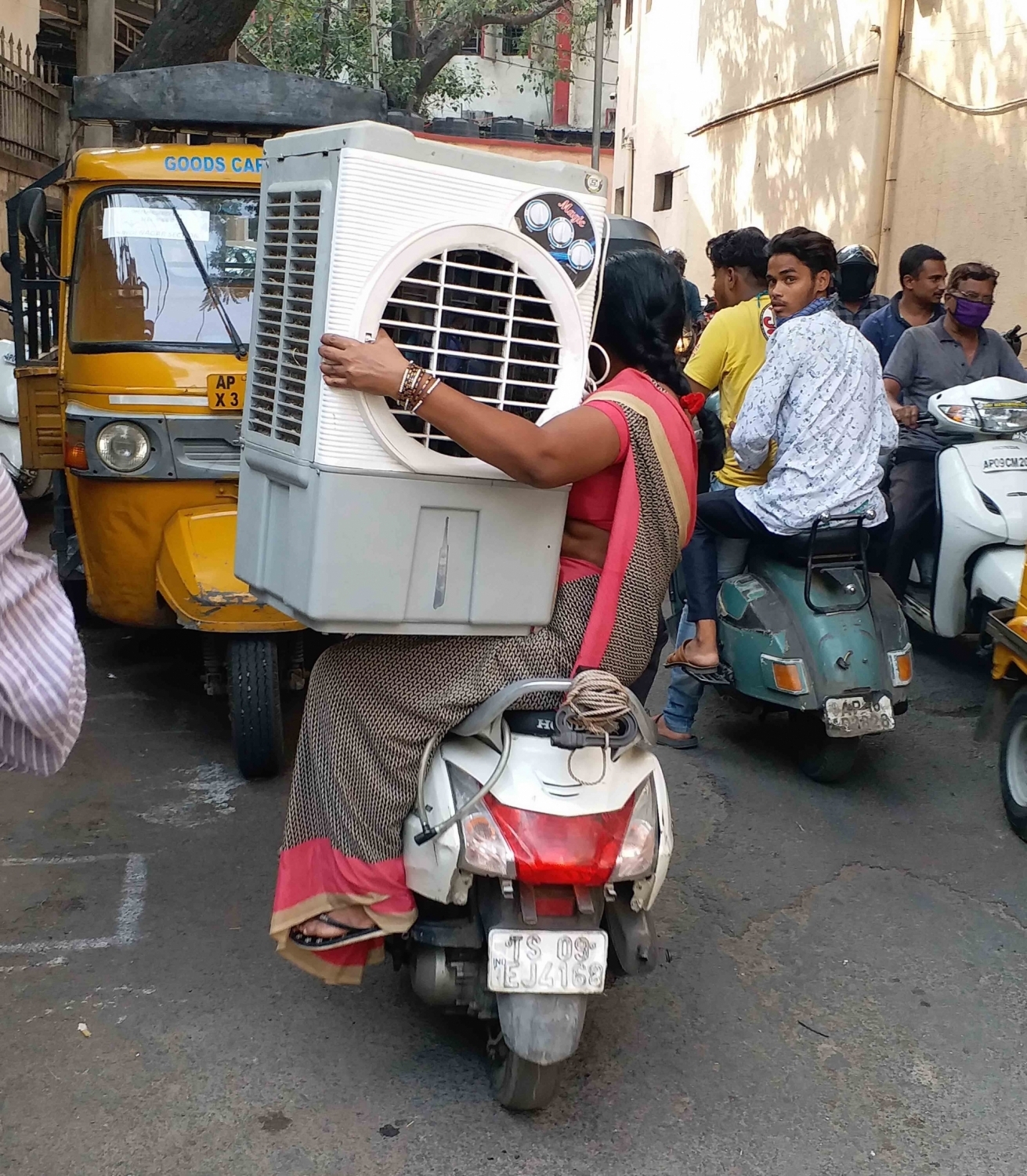 People take home a cooler to get some respite from heat as Hyderabad continues to reel under heatwave-like conditions