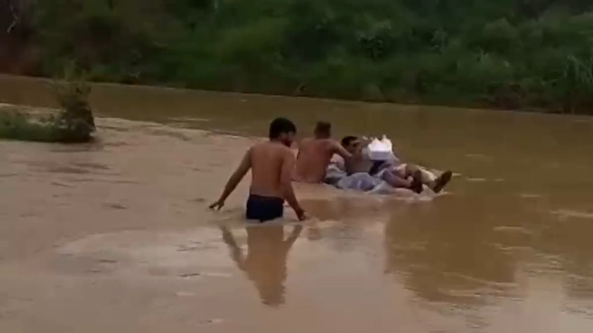 Teacher Risks Life, Crosses Swollen River On Tyre Tube To Reach School Amid Heavy Rain In Bhind