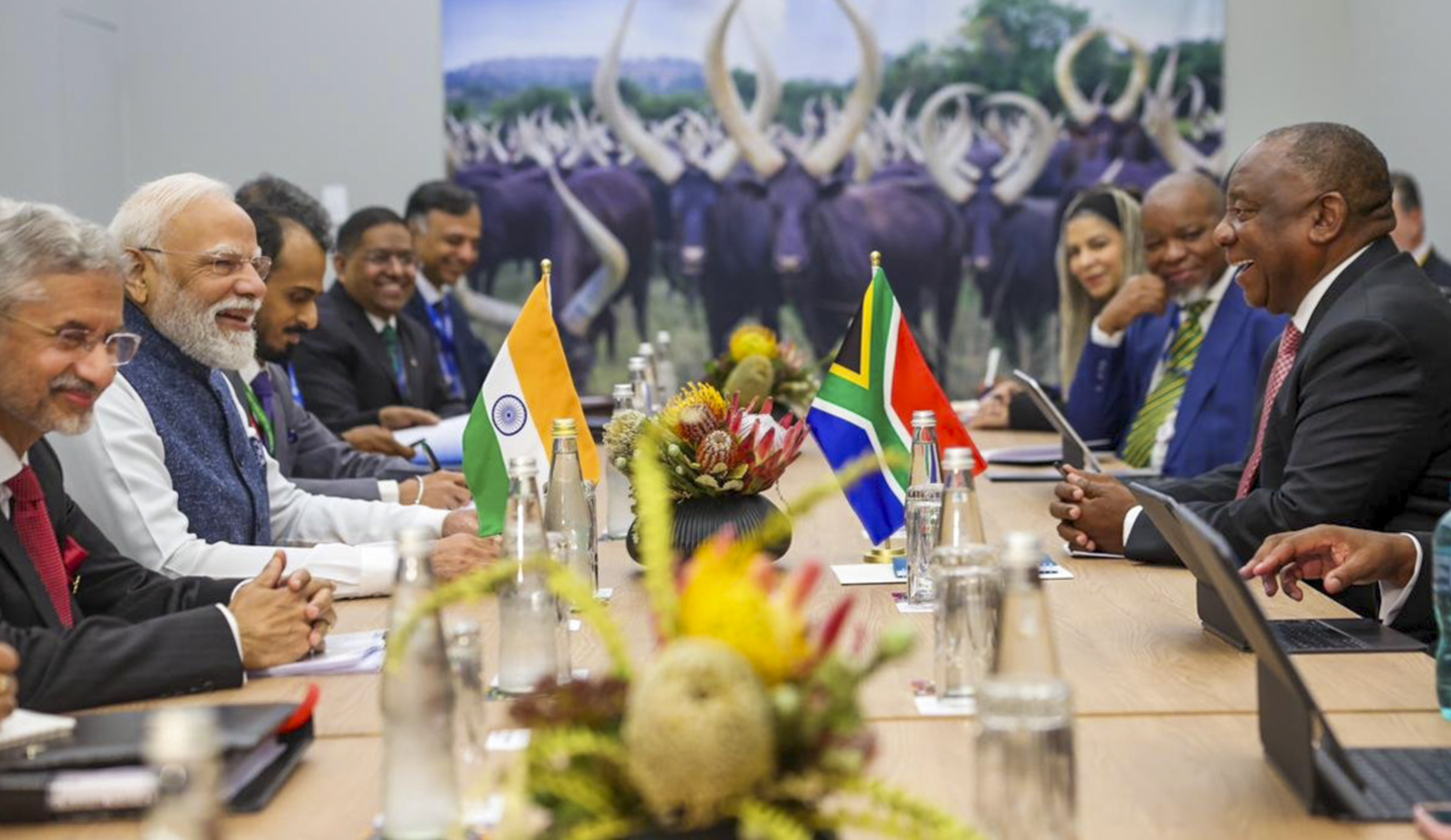Prime Minister Narendra Modi with South African President Cyril Ramaphosa a meeting, on the sidelines of the G20 Summit, in Johannesburg, South Africa. Other leaders and officials are also seen.