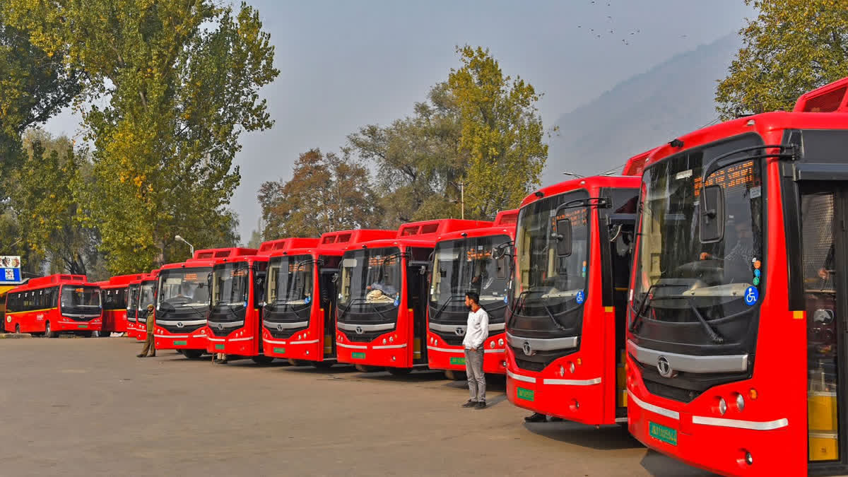 A fleet of electric buses at a depot in Jammu and Kashmir
