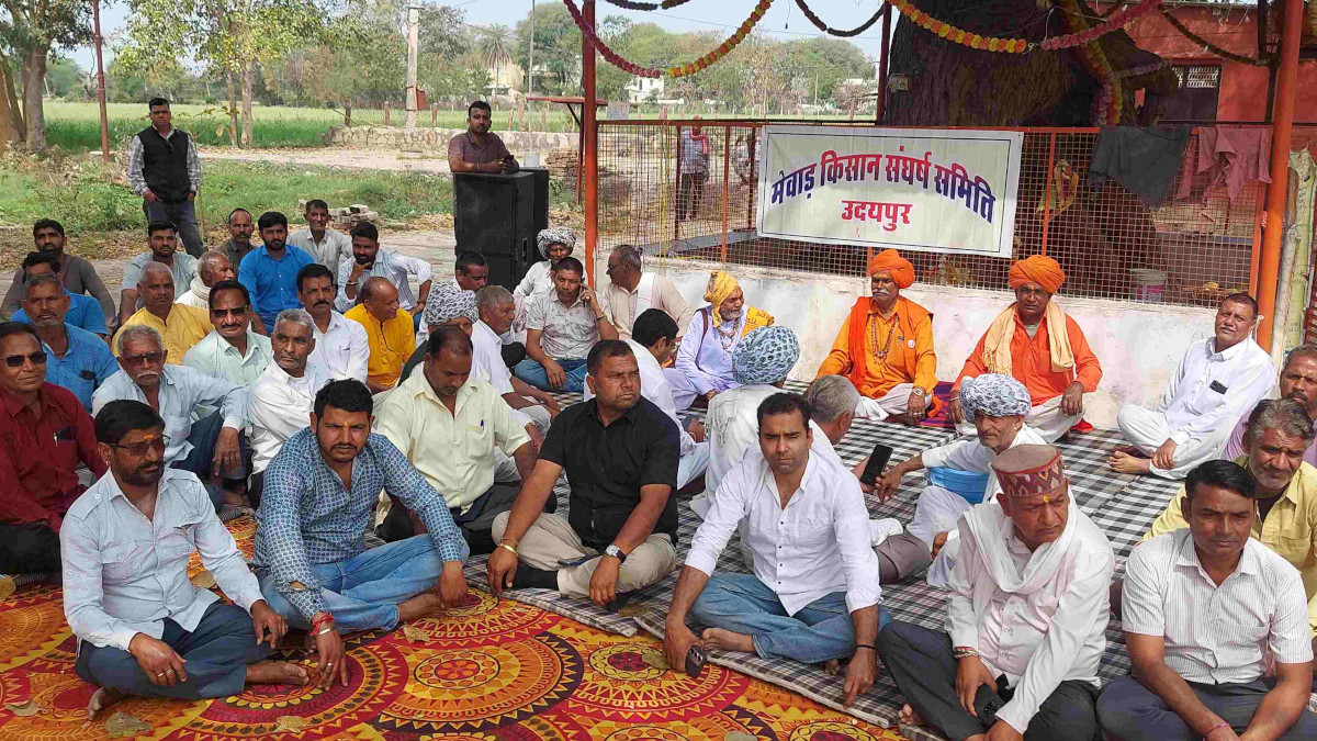 Villagers sitting on protest