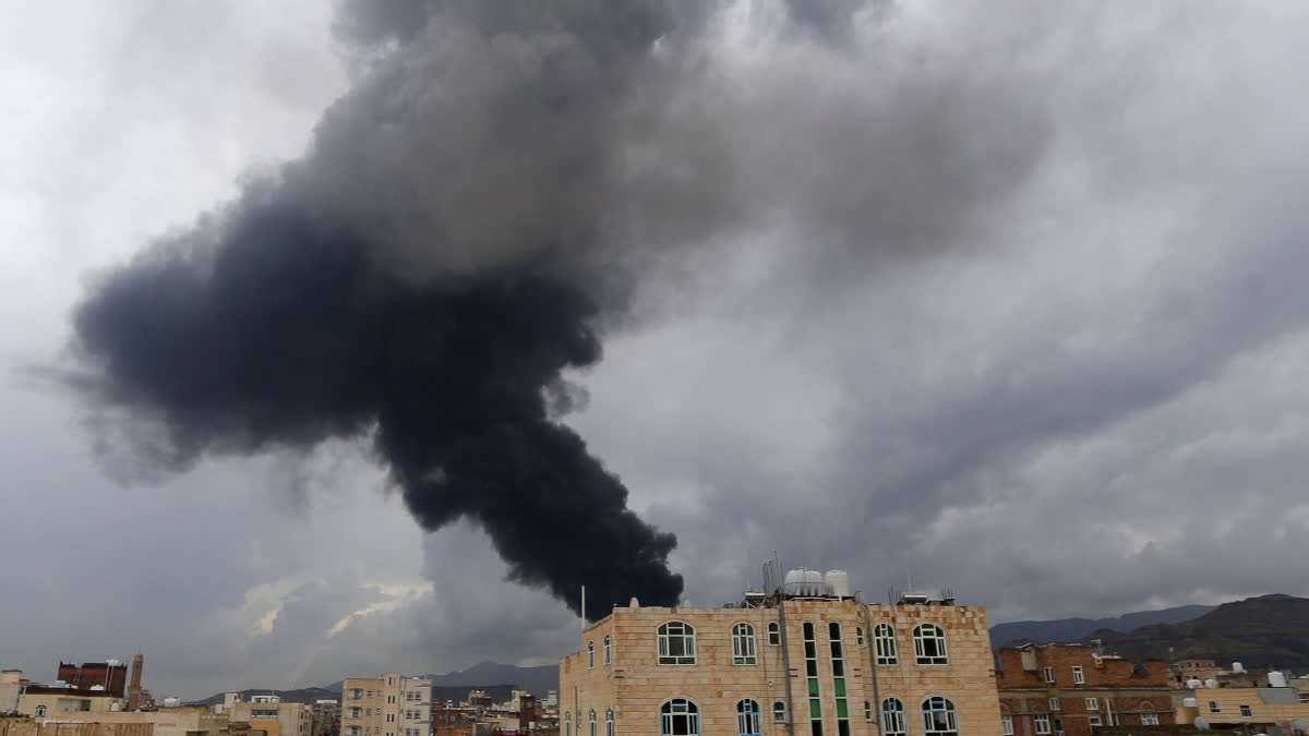 Smoke billows after an Israeli air strike on Yemen's Huthi-held capital Sanaa on August 24, 2025.