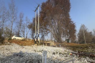 Icicles cover grass and ground on a winter morning, in Anantnag, Jammu and Kashmir, Monday, Nov. 24, 2025.