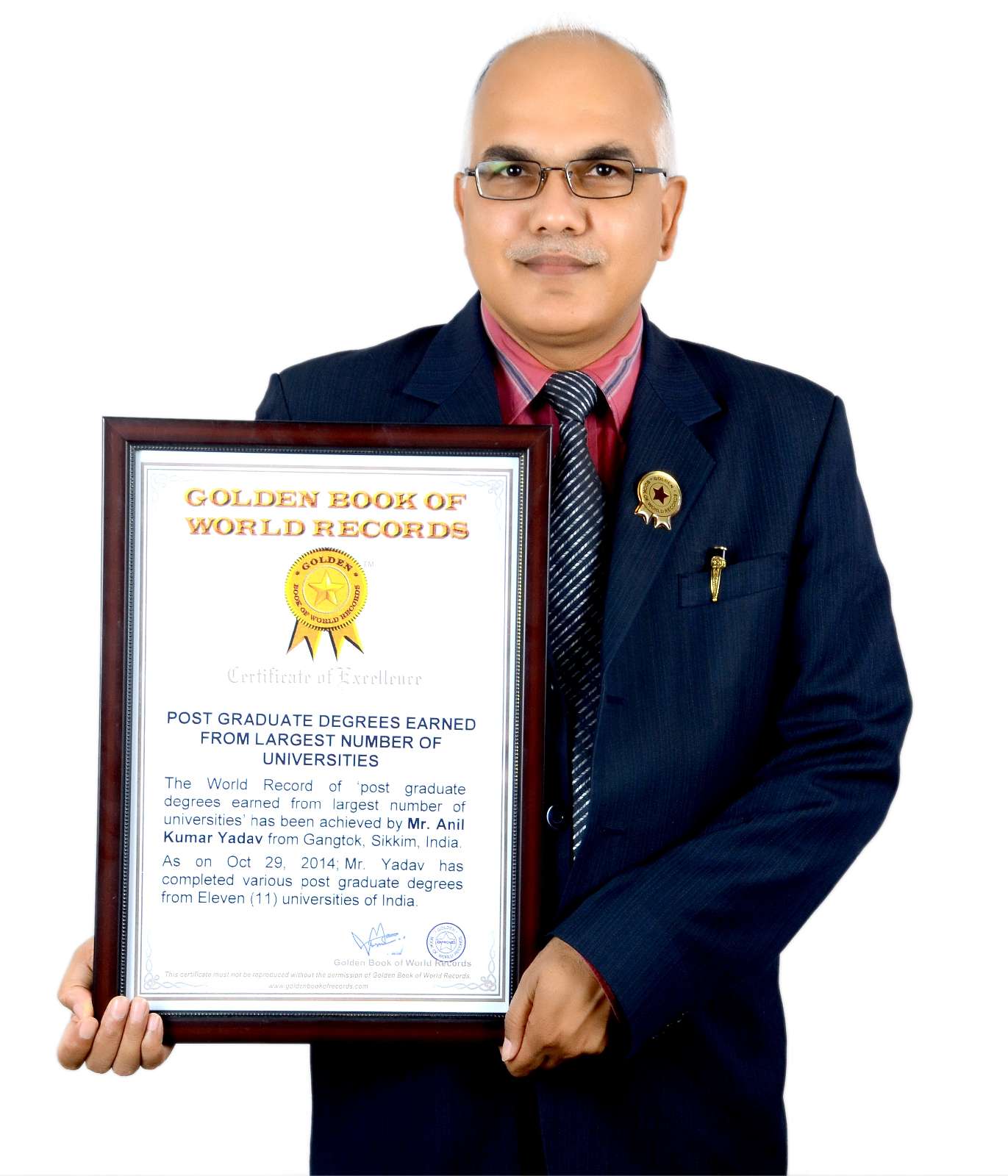 Dr Anil Kumar Yadav with the certification of the Golden Book of Records.