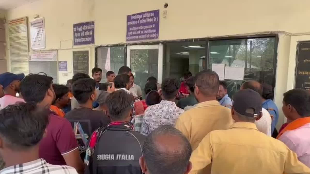 Family members protest at hospital.