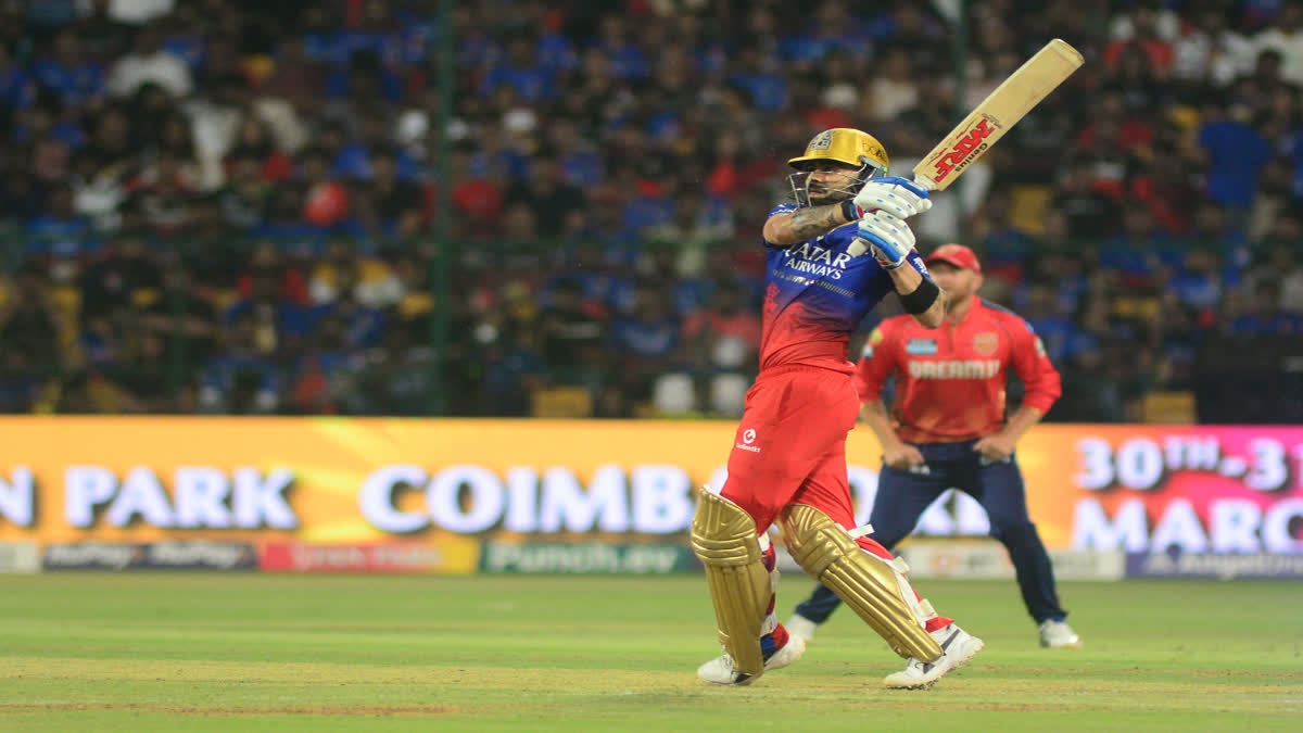 IPL 2024: Raichur Fan Enters the Field at Chinnaswamy Stadium; Touches Kohli's Feet Virat Kohli plays a shot during IPL game on Monday