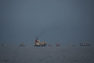File photo of oil tankers and cargo ships lined up in the Strait of Hormuz