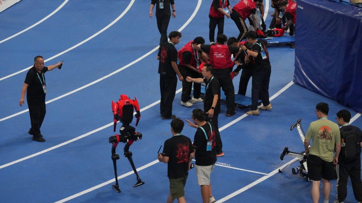 Humanoid robots were removed from the track after participating in a 100-meter race during the World Humanoid Robot Games in Beijing on Tuesday, August 25, 2026.