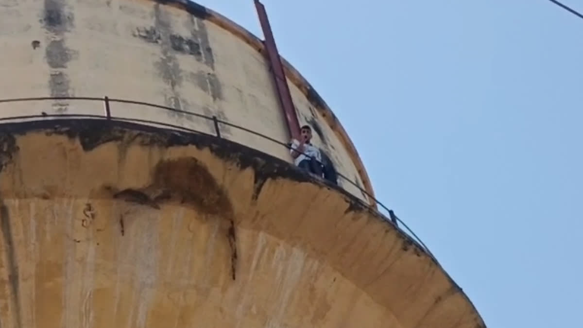 Youth on the tank in Alwar