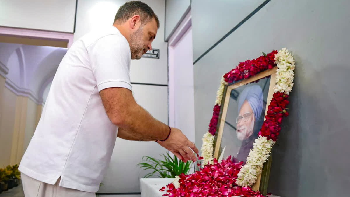 Congress Pays Tribute To Former PM Manmohan Singh On Death Anniversary In this image received on Dec. 26, 2025, LoP in the Lok Sabha and Congress leader Rahul Gandhi pays tribute to former prime minister Manmohan Singh on his first death anniversary, in New Delhi.