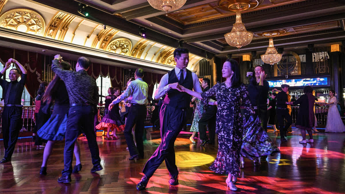 It was just a regular Wednesday at a lunchtime dance club in Shanghai, where dance hall culture has been deeply rooted in the city's identity since its jazz-age heyday. On any given day, multiple venues host hours-long daytime sessions across the finance hub, some starting as early as 6 am. Establishments like the historic Paramount Ballroom are time capsules from the 1930s, while others flash with neon pink and green rave lights in the early afternoon.
