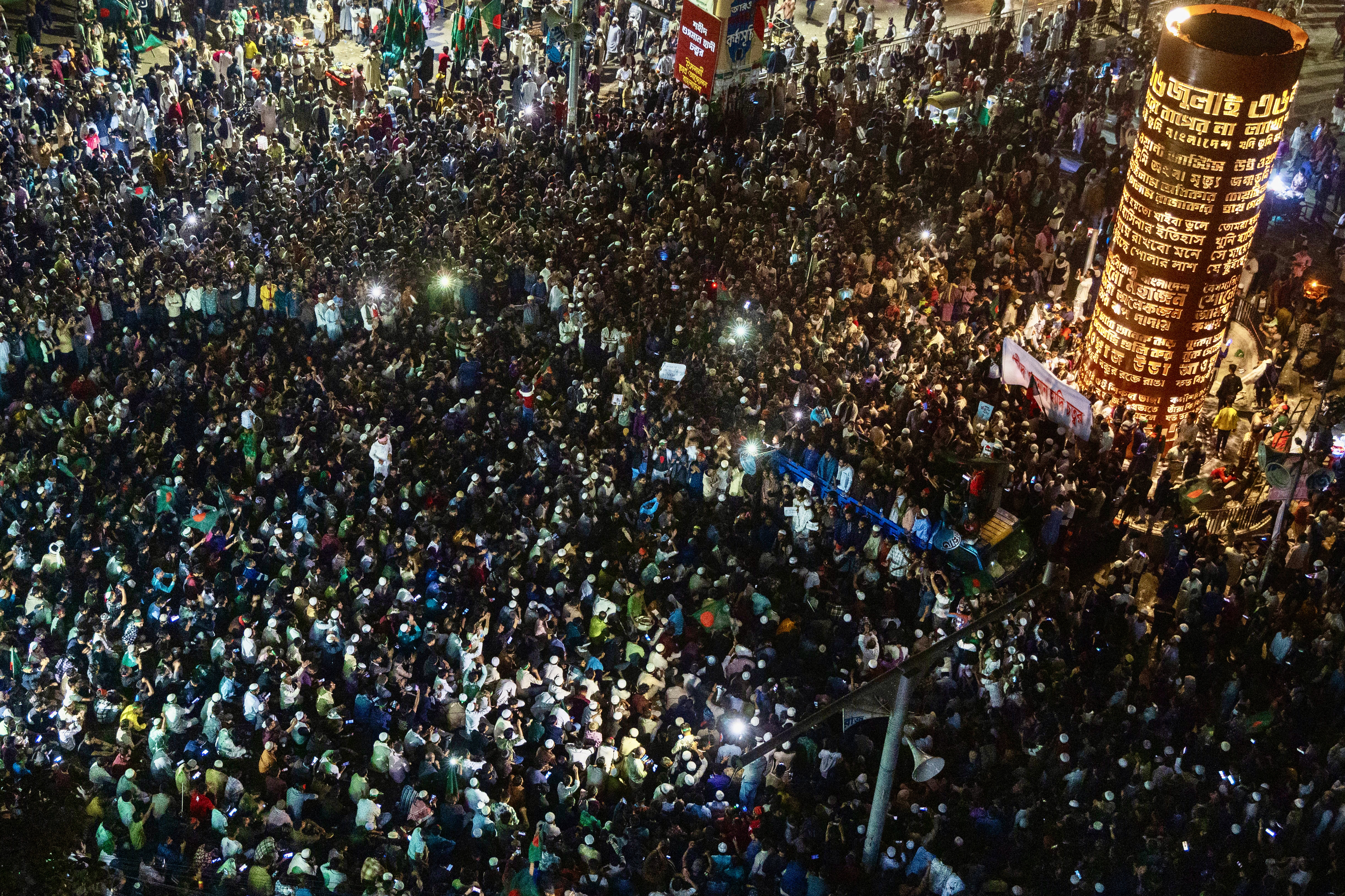 An aerial view shows protesters at Shahbagh intersection in Dhaka on December 19, 2025, following the death of youth leader Sharif Osman Hadi.