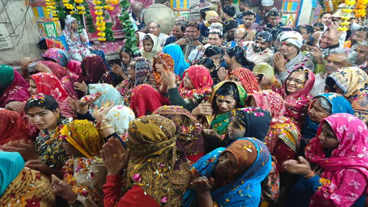 Devotees playing Holi with God at Charbhujanath Temple
