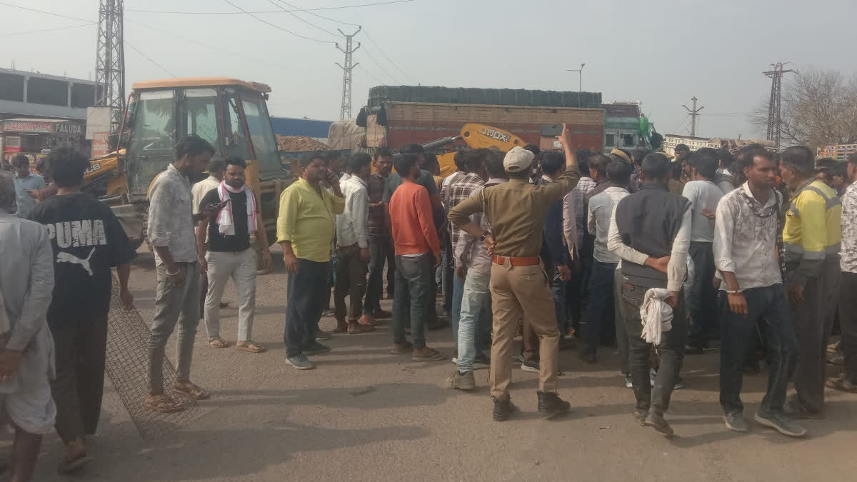 Policemen trying to clear the traffic jam on the highway