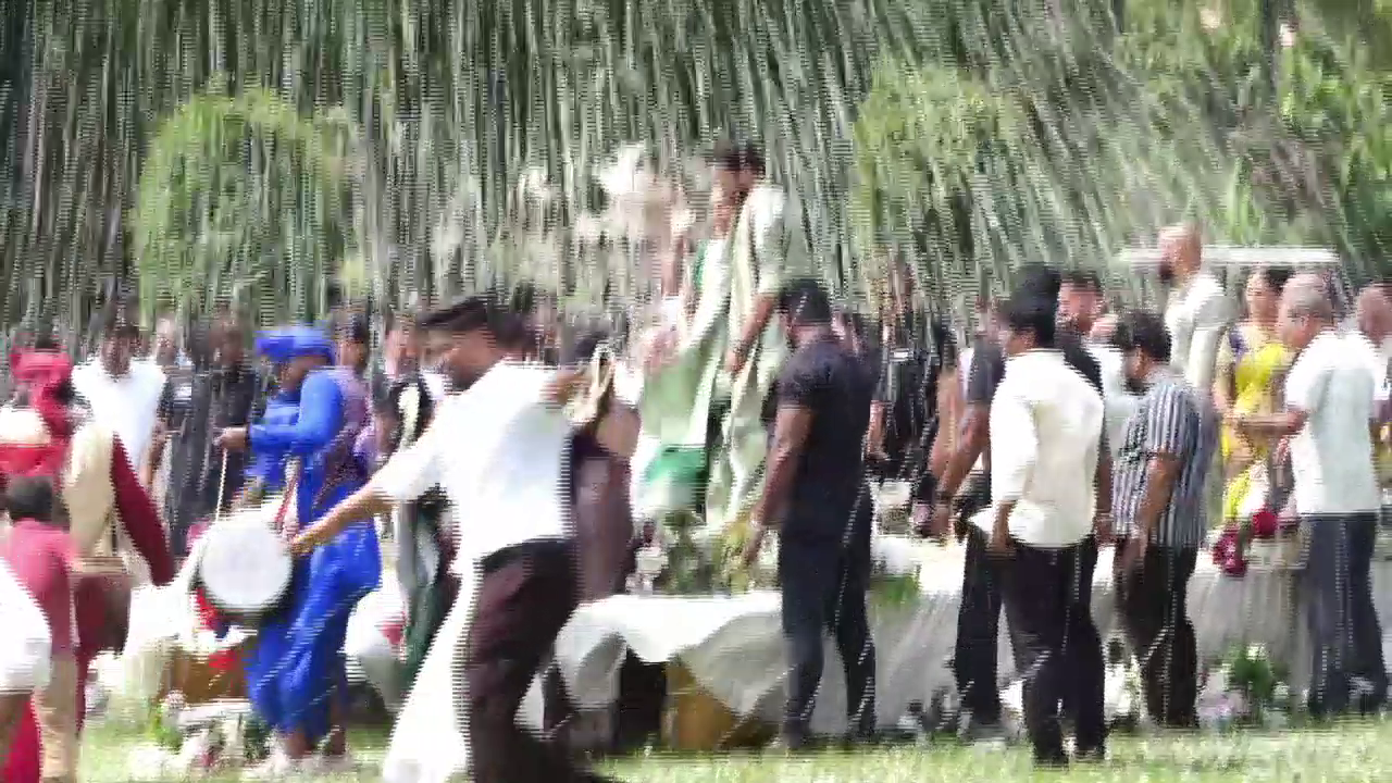 SPECIAL SEEMANTHAM  DAKSHINA KANNADA  FLOWER SHOWER FOR SEEMANTHAM  ಸೀಮಂತಕ್ಕೆ ಹೆಲಿಕಾಪ್ಟರ್​ನಿಂದ ಹೂಮಳೆ