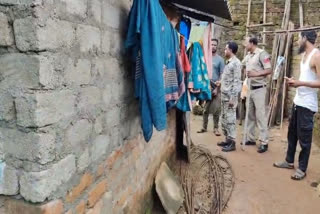 Police personnel in the house of the accused.
