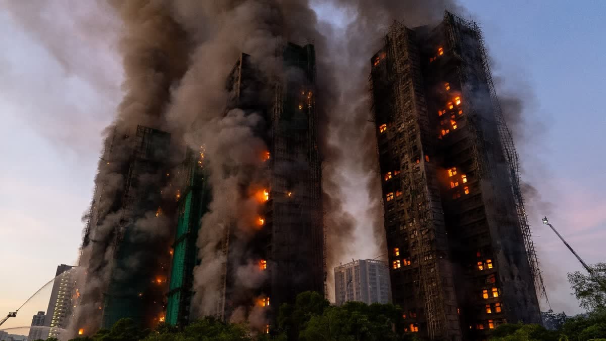 Smoke rises after a fire broke out at Wang Fuk Court, a residential estate in the Tai Po district of Hong Kong's New Territories on Wednesday, Nov. 26 2025