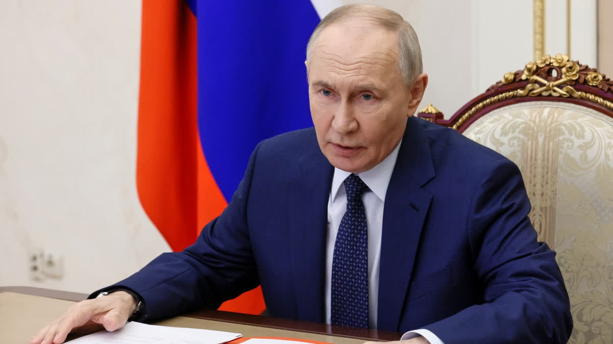 Russian President Vladimir Putin chairs a Security Council meeting via videoconference at the Kremlin in Moscow, Friday, Dec. 26, 2025.