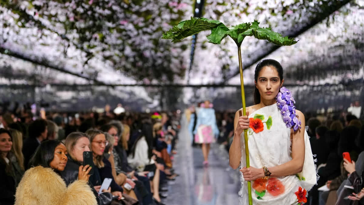 A model walks the ramp for Christian Dior at Paris Couture Week