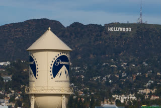 FILE - The Paramount Pictures water tower is seen in Los Angeles, Dec. 18, 2025, with the Hollywood sign in the distance.