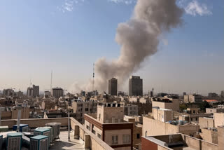 Smoke rises on the skyline after an explosion in Tehran, Iran, Saturday, Feb. 28, 2026