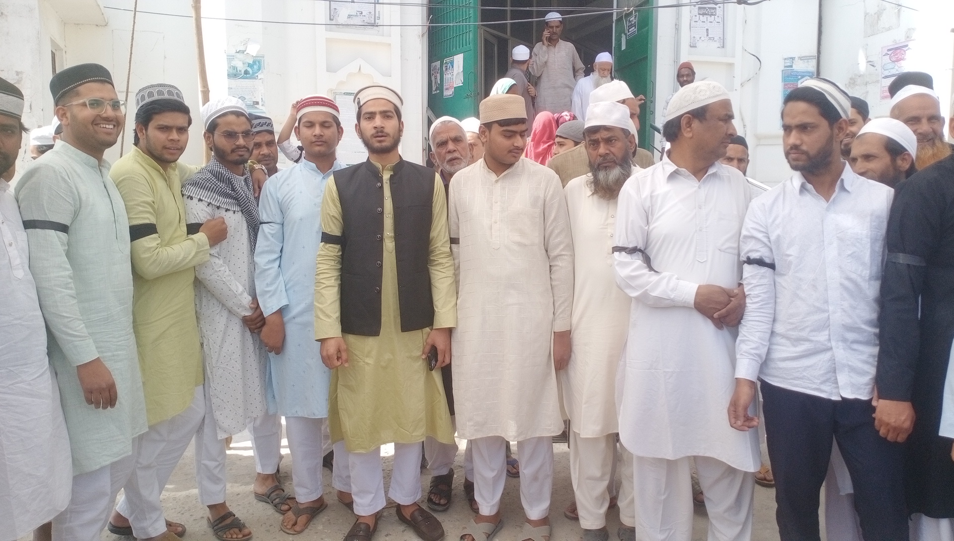 Muslims Wear Black Armbands During Friday Prayers