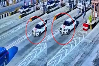 The CCTV grab of the incident showing the staff on the bonnet.