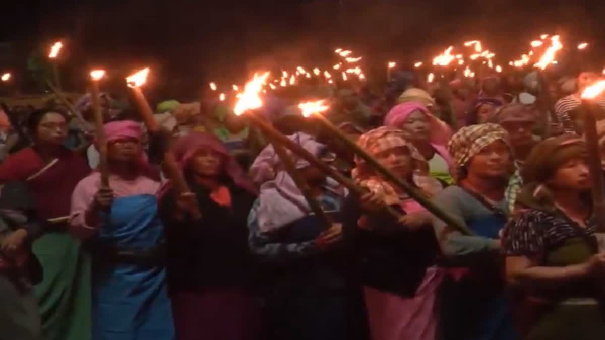 Meira Paibi activists hold massive torch rally in Imphal