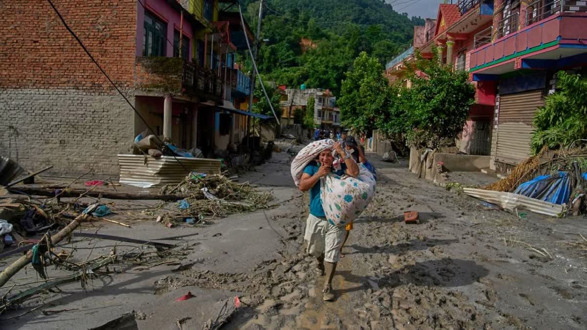 Nepal flash flood  Nepal flood rescue operations  Trishuli river flood damage  Bhote Koshi flood