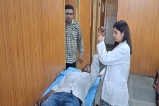 Physiotherapist performing physiotherapy