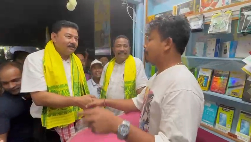 Minister Ranjit das visits shopkeepers at basugaon chirang for election campaign